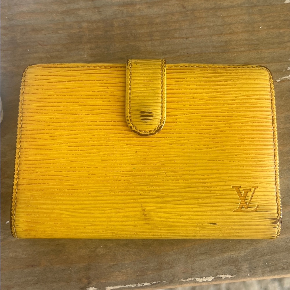 Louis Vuitton Epi Porte Monnaie Billets Viennois wallet in yellow epi leather.
